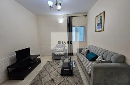 شقة - غرفة نوم - 2 حمامات للبيع في أورينت تاور 1 - أورينت تاور - البستان - عجمان