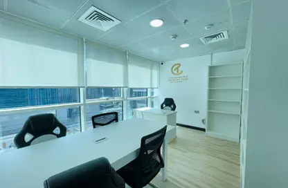 Office Space - Studio - 4 Bathrooms for rent in Hamdan Street - Abu Dhabi