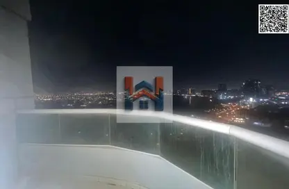 شقة - غرفة نوم - 2 حمامات للايجار في أورينت تاور 1 - أورينت تاور - البستان - عجمان