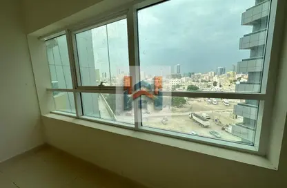 شقة - غرفة نوم - 2 حمامات للبيع في أورينت تاور 1 - أورينت تاور - البستان - عجمان