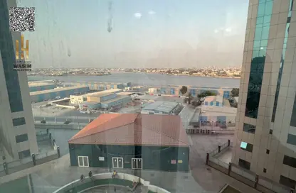Apartment - 1 Bedroom - 2 Bathrooms for sale in Orient Towers - Al Bustan - Ajman