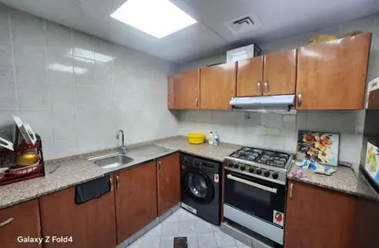 Apartment - 1 Bedroom - 1 Bathroom for rent in Orient Tower 1 - Orient Towers - Al Bustan - Ajman