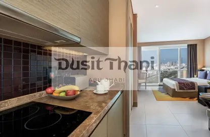 Kitchen image for: Hotel  and  Hotel Apartment - Studio - 1 Bathroom for rent in Dusit Thani Complex - Al Nahyan Camp - Abu Dhabi, Image 1