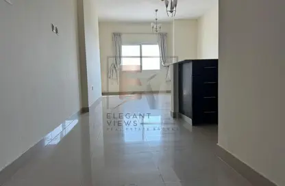 شقة - غرفة نوم - 2 حمامات للبيع في المساكن الحمراء - مدينة دبي الرياضية - دبي