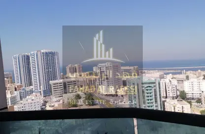 شقة - غرفة نوم - 2 حمامات للايجار في أورينت تاور 1 - أورينت تاور - البستان - عجمان