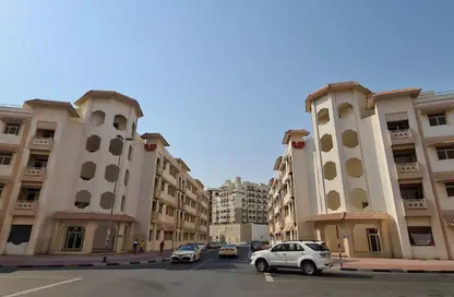 شقة - غرفة نوم - 2 حمامات للبيع في H03 - طراز الصين - المدينة الدولية - دبي